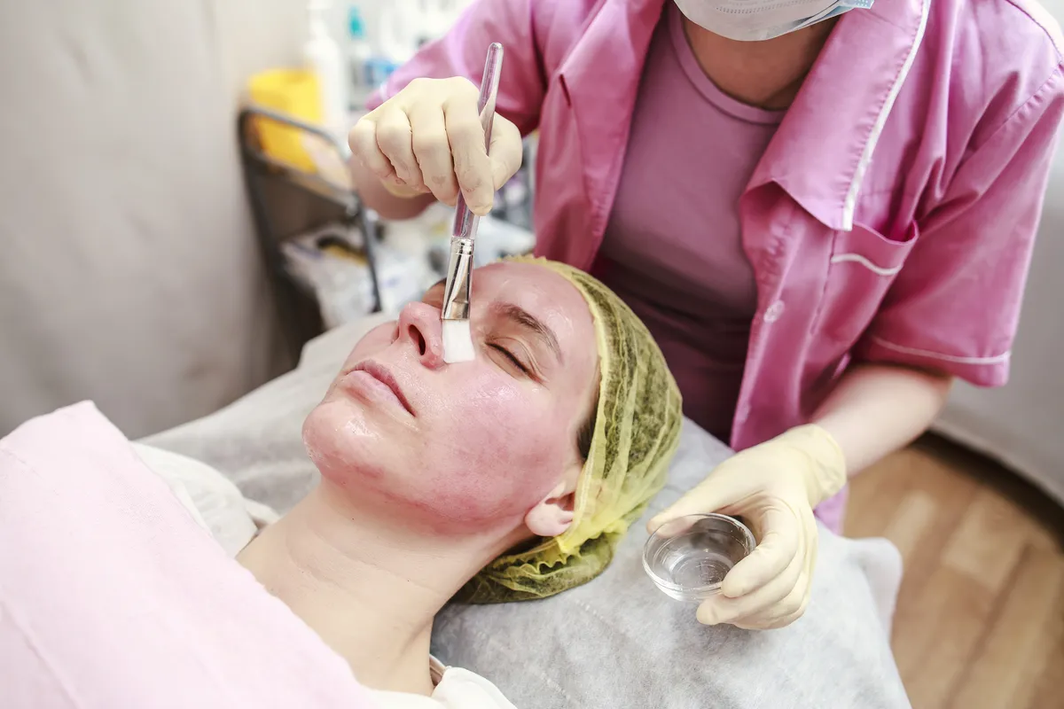 professional-beautician-puts-on-the-skin