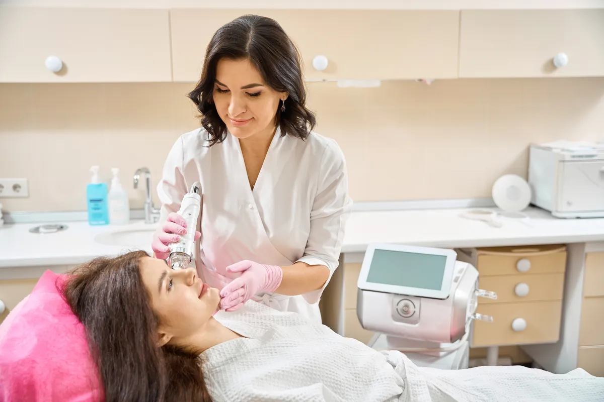 qualified-dermatologist-carrying-out-rf